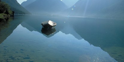 Ausflug mit Kindern - Berwang - glasklares Wasser, naturbelassen und mit strahlendem Sonnenschein - das gibts nur am Heiterwanger See - Badesee Heiterwanger See