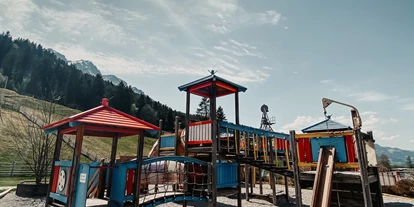 Trip with children - Bernau am Chiemsee - Kinderspielplatz beim Freizeitpark Zahmer Kaiser in Walchsee/Tirol - Sommerrodelbahn Walchsee