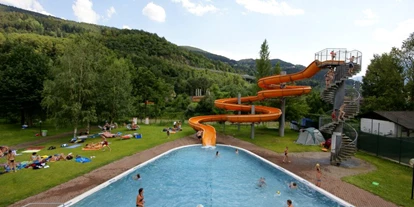 Trip with children - St. Vigil - Wasserrutsche - Freischwimmbad Klausen
