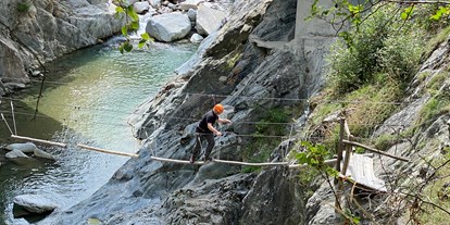 Ausflug mit Kindern - Hunde: teilweise erlaubt - Graubünden - Abenteuer Seilpark "Curtin Medelin"
