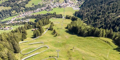 Ausflug mit Kindern - Sportanlage: Rodelbahn - Davos Frauenkirch - Pradaschier. Der Erlebnisberg.