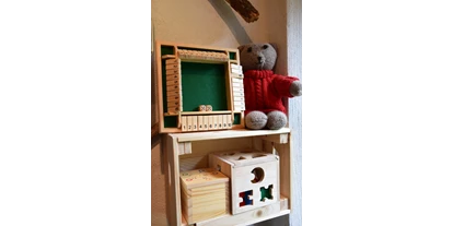 Ausflug mit Kindern - Präbichl - Auch für unsere kleinsten Gäste ist mit Holzspielzeug für Kurzweil gesorgt  - Schroeders Almenland Kräuterwerkstatt