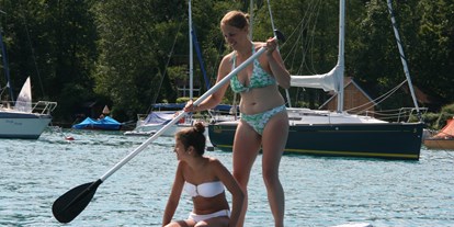 Ausflug mit Kindern - Brunn (Straßwalchen) - StandUP Paddel dürfem im Sommer bei uns natürlich auch nicht fehlen! - Yachtschule Koller