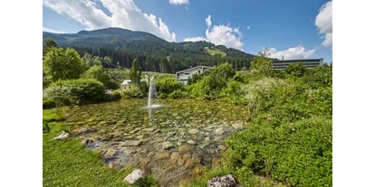 Trip with children - Witterung: Regenwetter - Kirchberg in Tirol - Minigolf Saalbach