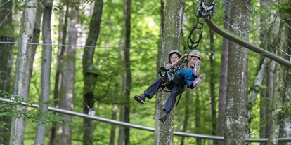 Ausflug mit Kindern - Themenschwerpunkt: Klettern - Top Ausflugsziel Kärnten Familywald Ossiacher See mit Österreichs 1. Waldachterbahn Fly-Line - Familywald Ossiacher See