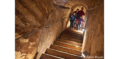 Ausflug mit Kindern - Familie im Tiefkeller (nur mit Führung zugänglich) - Festung Königstein