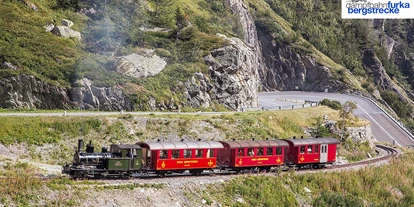 Ausflug mit Kindern - TOP Ausflugsziel 2024 - Schweiz - Extrazug kurz nach dem Kehrtunnel Richtung Gletsch. - Dampfbahn Furka Bergstrecke
