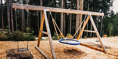 Ausflug mit Kindern - Ausflugsziel ist: eine Sommerrodelbahn - Österreich - Waldspielpark im Freizeitpark Zahmer Kaiser
