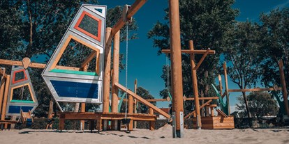 Ausflug mit Kindern - sehenswerter Ort: Wahrzeichen - Sandspielplatz - PODOplay