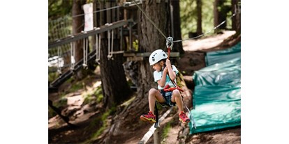 Ausflug mit Kindern - Ausflugsziel ist: ein Kletterpark - Adventure lives here! - Abenteuer im Hochsailgarten in Colfosco