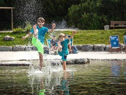 Reis met kinderen - Themenschwerpunkt: Wandern - Oostenrijk - Steinplatte Waidring Triassic Park  - Triassic Park auf der Steinplatte