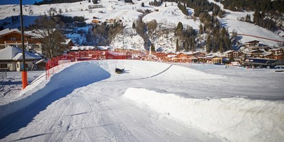 Ausflug mit Kindern - Ausflugsziel ist: ein Skigebiet - Schloßberg (Maria Alm am Steinernen Meer) - Snowtubing