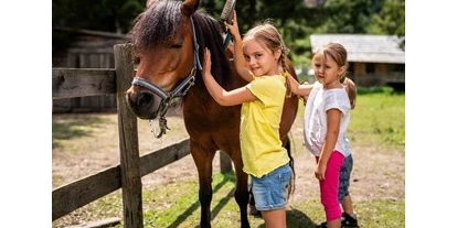 Trip with children - Witterung: Schnee - Feld am See - Trattlers Ponyfarm - Trattlers Ponyfarm 