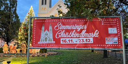 Ausflug mit Kindern - Gänserndorf - Kirche, davor ist der Christkindlmarkt - Simmeringer Christkindlmarkt