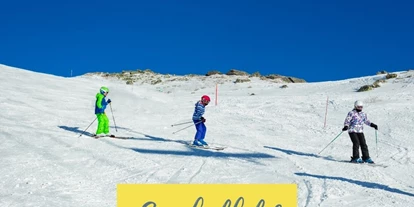 Trip with children - Themenschwerpunkt: Skifahren - Tarvis - Symbolbild für ein Skigebiet - Skigebiet Weissensee