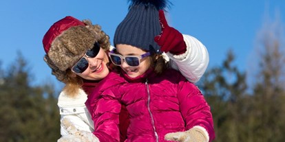 Ausflug mit Kindern - Themenschwerpunkt: Bewegung - Radein - Symbolbild Skifahren - Skigebiet Carezza Ski