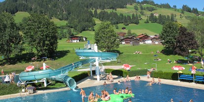 Ausflug mit Kindern - Witterung: Bewölkt - PLZ 6234 (Österreich) - Freibad Wildschönau: Auf dem grünen Krokodil tummelt es sich! - Freischwimmbad Wildschönau