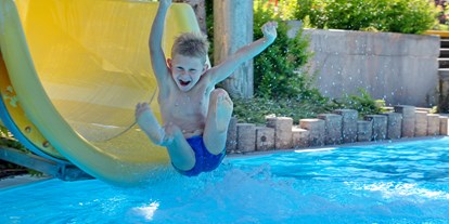 Ausflug mit Kindern - Dauer: ganztags - Weißbriach - Wasserrutsche im Erlebnisbad - Waldbad Dellach im Drautal