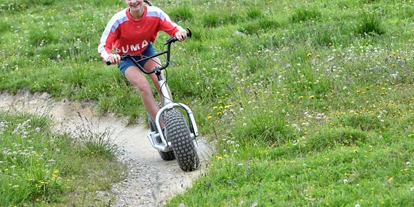 Reis met kinderen - Ried im Oberinntal - Monstertrotti - © Mario Curti - Family Kletter- und Boulderpark auf der Alp Trida