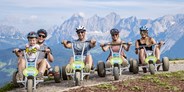 Ausflug mit Kindern - Steiermark - Start Mountain Gokart mit Ausblick auf das Dachstein Massiv - Gipfelbahn Hochwurzen