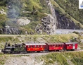 Ausflugsziel: Extrazug kurz nach dem Kehrtunnel Richtung Gletsch. - Dampfbahn Furka Bergstrecke