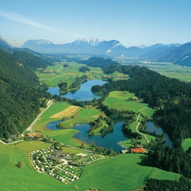 Ausflugsziel: Reintalersee in Kramsach in Tirol. Copyright Alpbachtal Tourismus - Naturbadesee Reintaler See