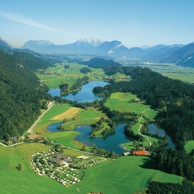 Ausflugsziel: Reintalersee in Kramsach in Tirol. Copyright Alpbachtal Tourismus - Naturbadesee Reintaler See