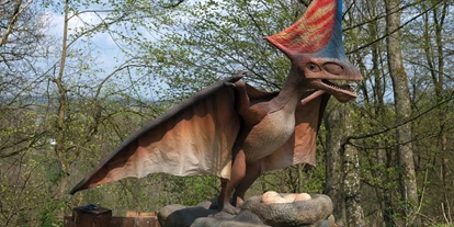 Reis met kinderen - Umgebungsschwerpunkt: Fluss - Dinoland im Schlosspark Katzenberg