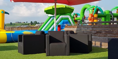 Voyage avec des enfants - Morschach - Grosser Wasserpark auf der Terrasse auf über 600m² - Indoorspielplatz Einsiedeln