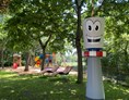 Ausflugsziel: Kinderspielplatz im Donaubräu mit Maskottchen Doni - Donauturm Wien