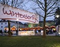 Ausflugsziel: Bad Schallerbacher Winterdorf - Eislaufplatz im Winterdorf Bad Schallerbach