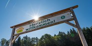 Ausflug mit Kindern - Oberösterreich - Herzlich Willkommen - Schild am Baumkronenweg  - Baumkronenweg Kopfing