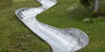 Ausflug mit Kindern - Wald am Arlberg - Symbolbild für Ausflugsziel Sommerrodelbahn Wally-Blitz. Keine korrekte oder ähnlich Darstellung! - Sommerrodelbahn Wally-Blitz