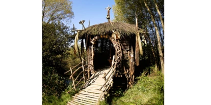 Viaggio con bambini - Kinderwagen: großteils geeignet - Holzhütte - Wildgarten mit Unterwasserbeobachtungstation