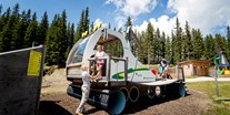 Ausflug mit Kindern - Altaussee - Überdimensionales Holz-Pistengerät - Hopsiland Planai