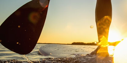 Reis met kinderen - Münstertal - Symbolbild für Ausflugsziel Stand Up Paddling Windgfällweiher. Keine korrekte oder ähnlich Darstellung! - Stand Up Paddling Windgfällweiher