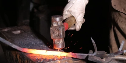 Viaggio con bambini - PLZ 4163 (Österreich) - Symbolbild für Ausflugsziel Hammerschmiede. Keine korrekte oder ähnlich Darstellung! - Hammerschmiede