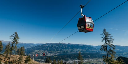 Voyage avec des enfants - PLZ 9570 (Österreich) - Talbahn Goldeck im Sommer mit Blick über Spittal/Drau und den Millstätter See - Goldeck Bergbahnen